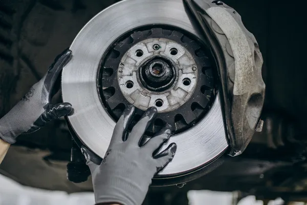 mechanic changing brake discs car service_result